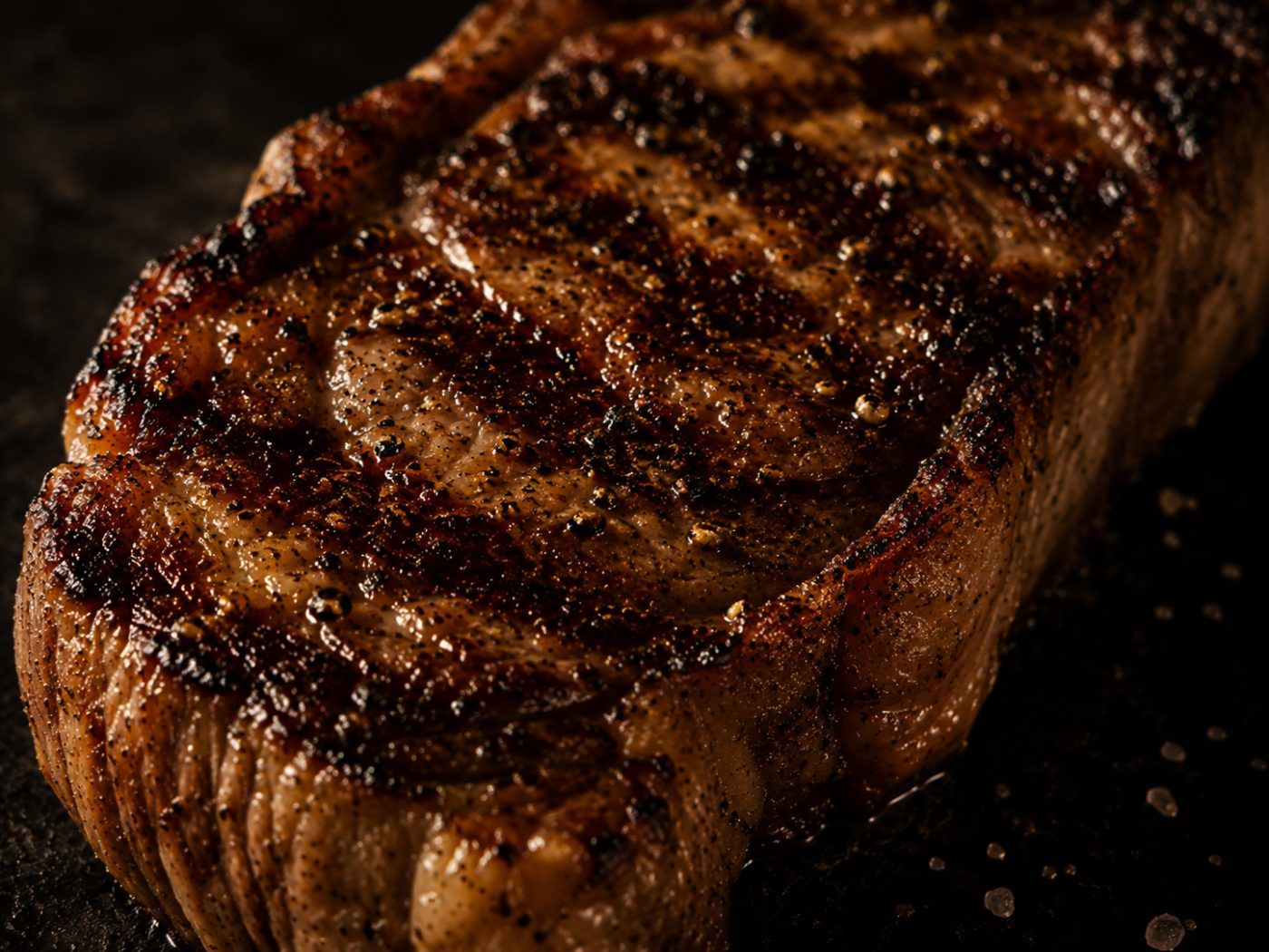A close crop of a seared cut of beef